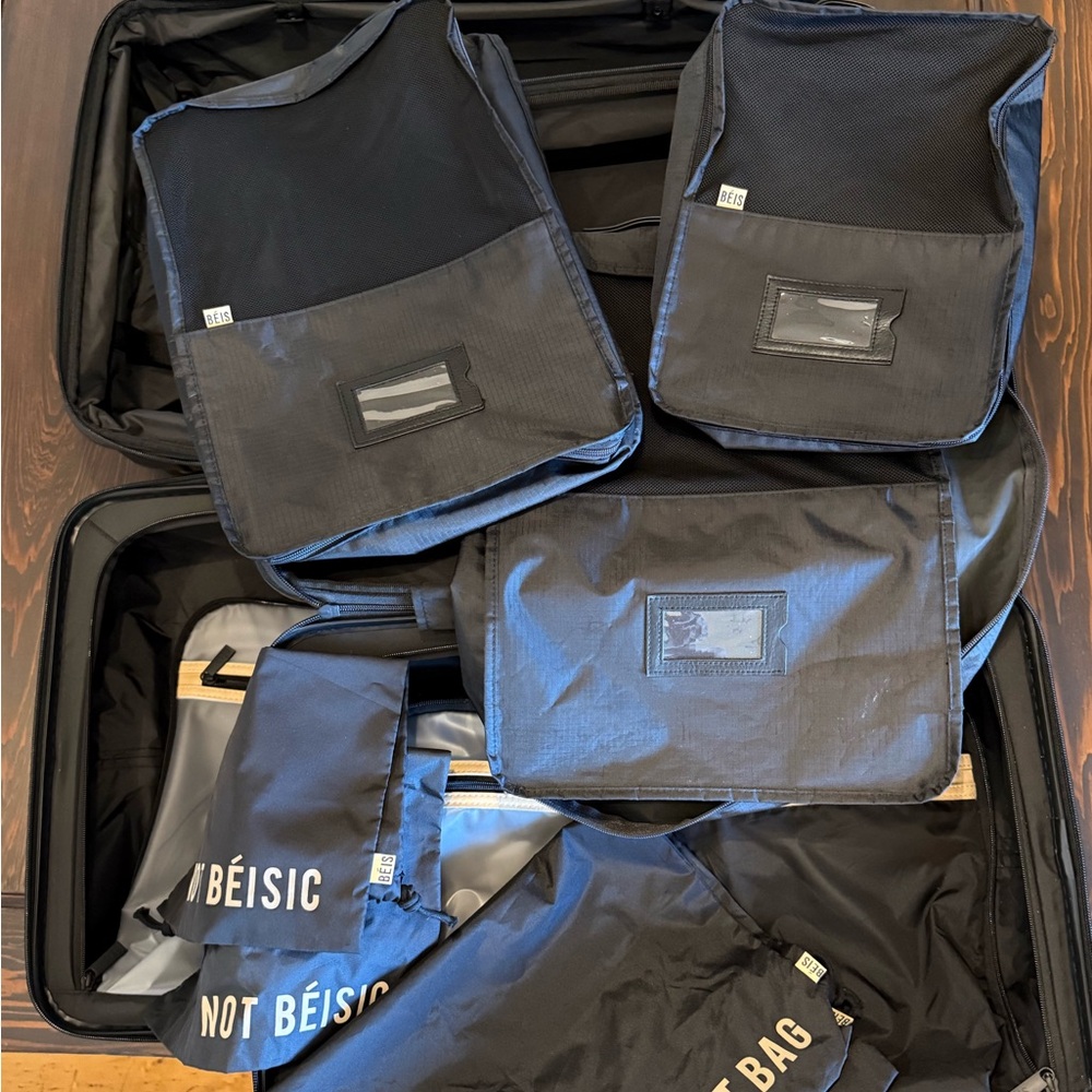 BEIS Black Rolling Suitcase Set
One Medium Check In Roller
One Carry On Roller - Picture 8 of 10